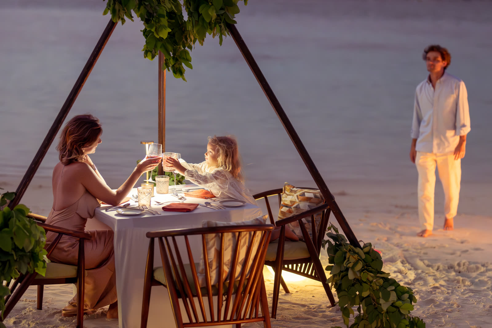 Evening beach dinner scene from a POBO shoot